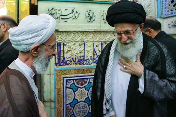 Ayatollah Mohamad Taqi Mesbah-Yazdi (left) and Iran’s ruler Ali Khamenei