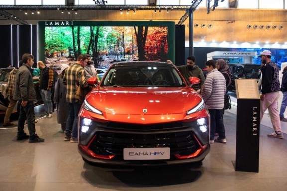 Chinese car Dongfeng's T5 EVO is displayed as Iran-assembled Lamari EAMA at Tehran International Exhibition, January 2025