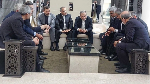Iran's Foreign Minister Abbas Araghchi along with his deputies