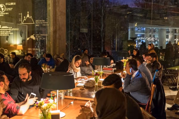 Café closures mount after protests as Iran’s job market freezes