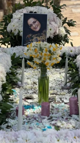 The grave of Arezoo Abedi during a memorial marking the fortieth day after her death