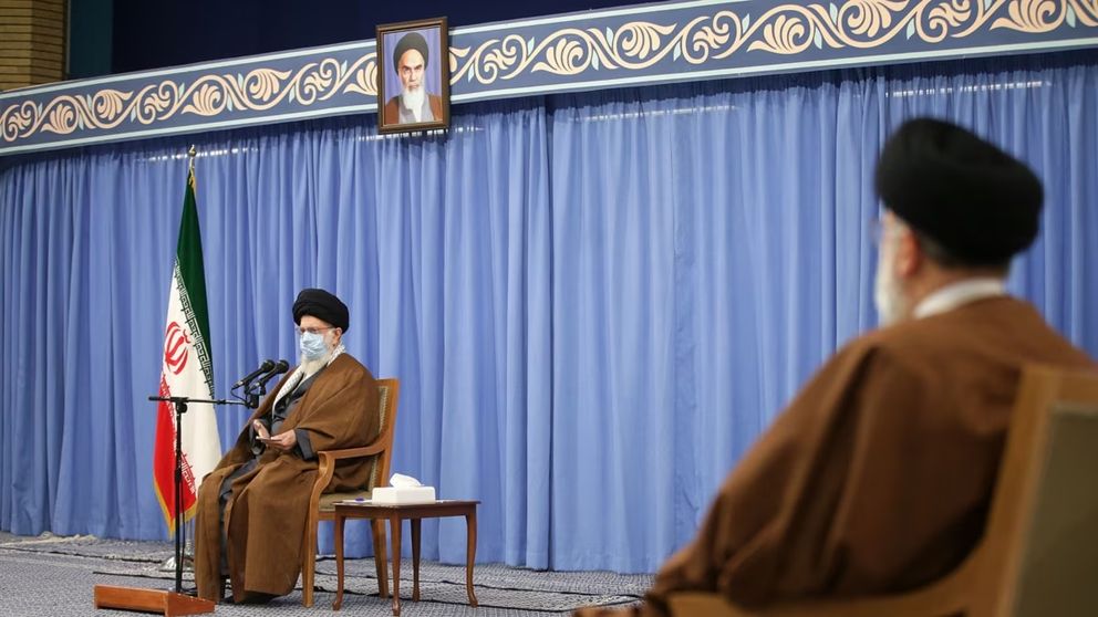 Iran’ Supreme Leader Ali Khamenei (left) and President Ebrahim Raisi    