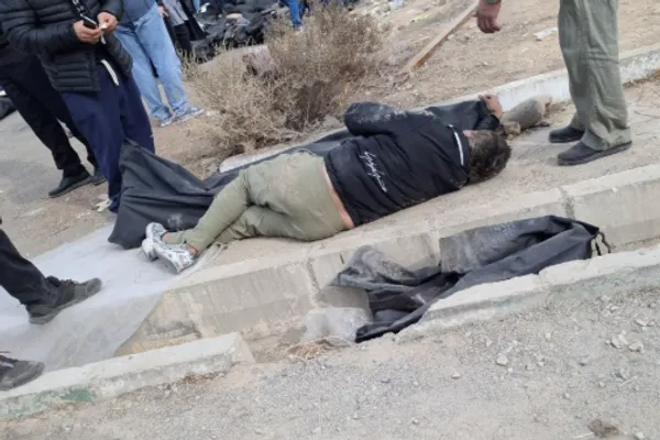 Iranian teen hid in body bag among slain protestors to survive - rights group