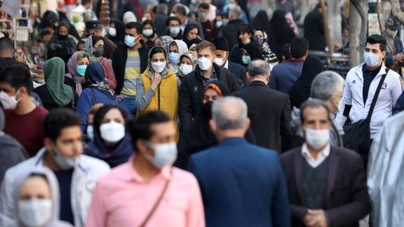 People walking in a busy Tehran street, November 2021