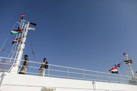 People tour the deck of the Galaxy Leader commercial ship, seized by Yemen's Houthis last month, off the coast of al-Salif, Yemen December 5, 2023.