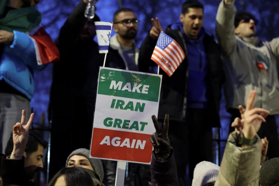 Demonstrators gesture outside the Iranian embassy during a rally in support of nationwide protests in Iran, in London, Britain, January 12, 2026.