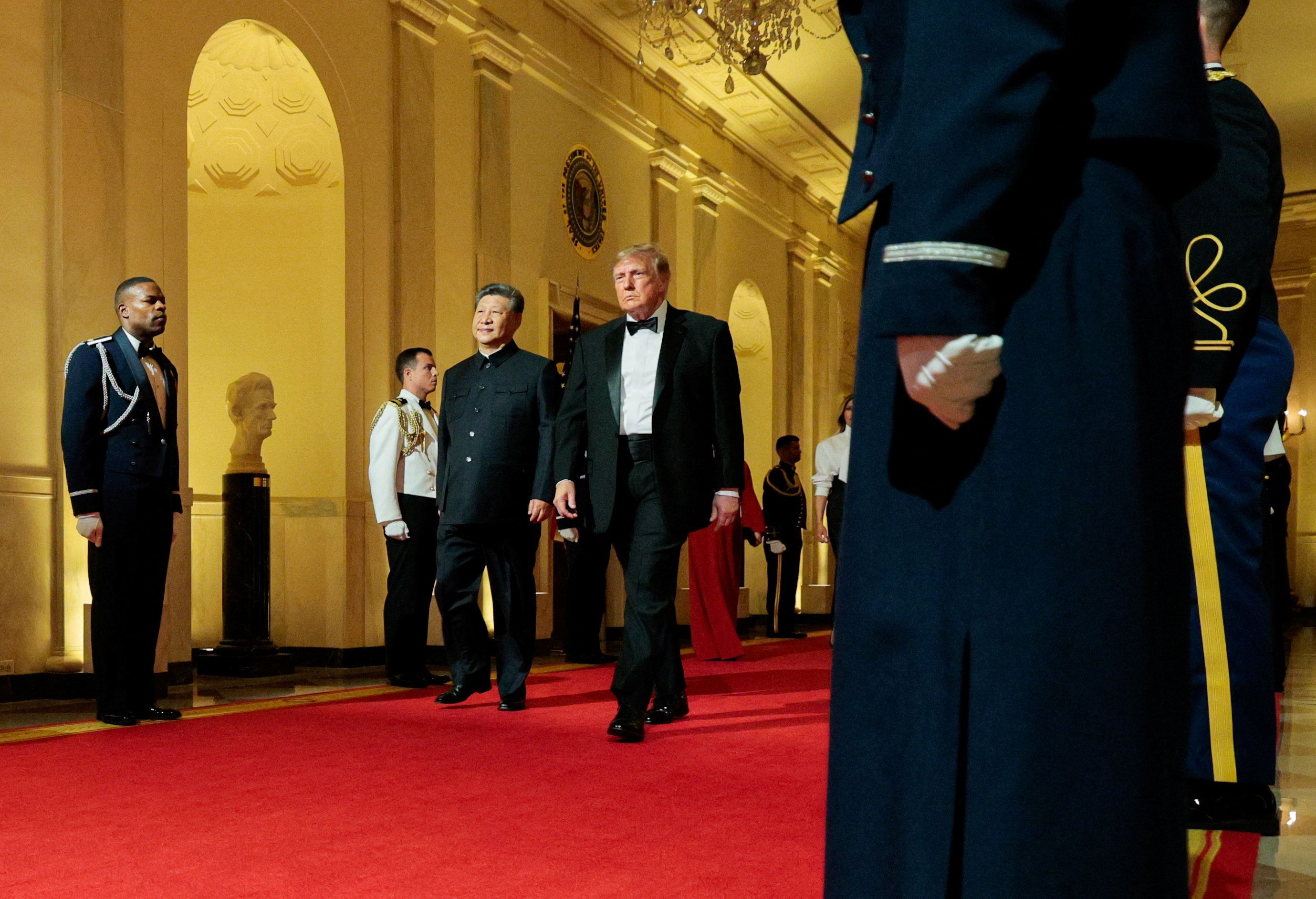 US President Donald Trump and Chinese President Xi Jinping speak during a state dinner at the White House in Washington, DC, US, September 24, 2026. 