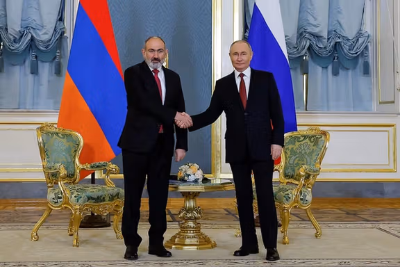 Russian President Vladimir Putin and Armenian Prime Minister Nikol Pashinyan shake hands during a meeting on the sidelines of the summit of the Eurasian Economic Union (EAEU) in Moscow, Russia, May 8, 2024.