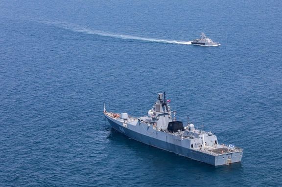 A Russian warship is seen during a joint naval military drill between Iran, Russia, and China in the Gulf of Oman, Iran, in this picture obtained on March 15, 2023.