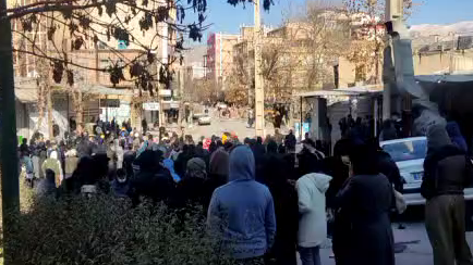 People in Javanrud gathering to march to the cemetery for mourning ceremonies for protester killed in November