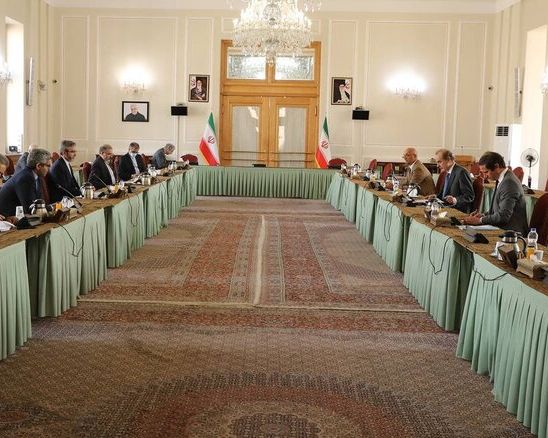 EU's Enrique Mora negotiating with the Iranian delegation in Tehran. Oct. 14,2021