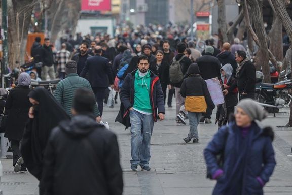 Pedestrians walk near Tehran's Grand Bazaar, January 2026