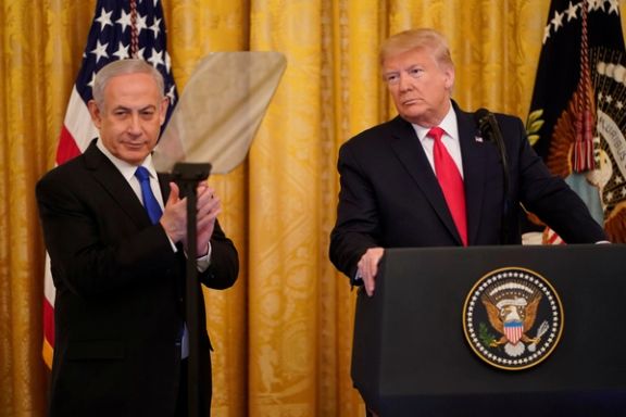 Israel's Prime Minister Benjamin Netanyahu applauds as he and US President Donald Trump deliver joint remarks on a Middle East peace plan proposal in the East Room of the White House in Washington, US, January 28, 2020.