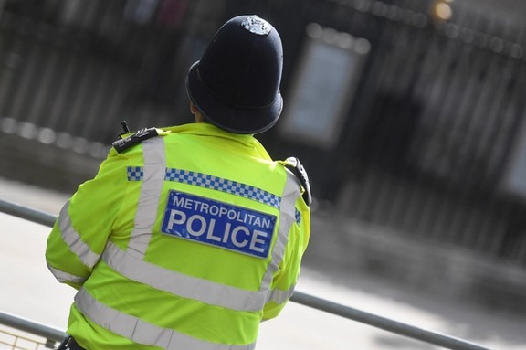 A Metropolitan Police officer stands on duty in Westminster, London, Britain.