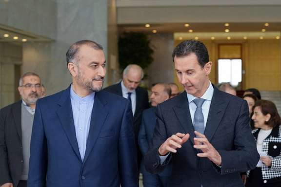 Hossein Amir-Abdollahian visiting Assad in 2022