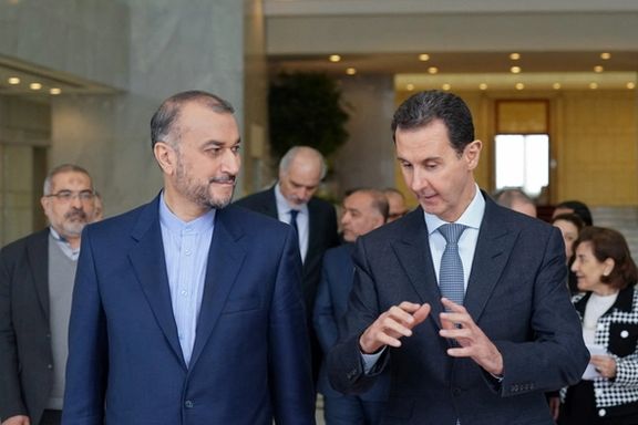 Hossein Amir-Abdollahian visiting Assad in 2022