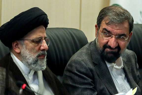 President Ebrahim Raisi (left) and former vice president for economic affairs Mohsen Rezaei