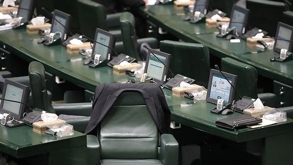 An empty seat during a session of the Iranian parliament. February 20, 2023