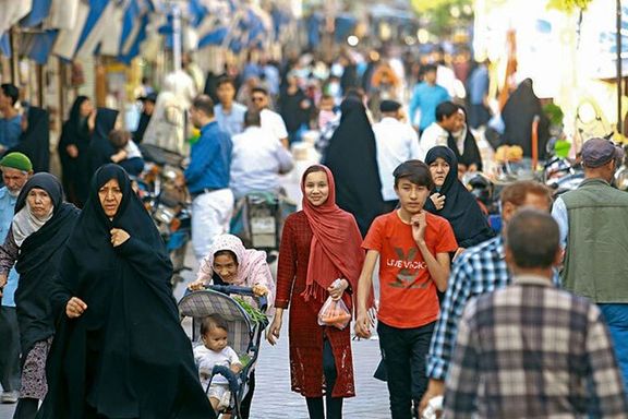 Afghan immigrants at a Tehran market
