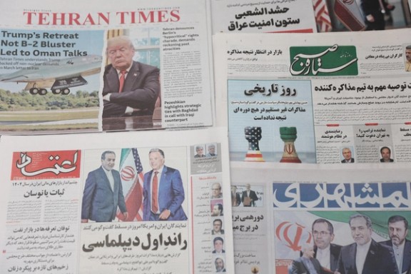 Iranian newspapers with coverage of nuclear talks with the US