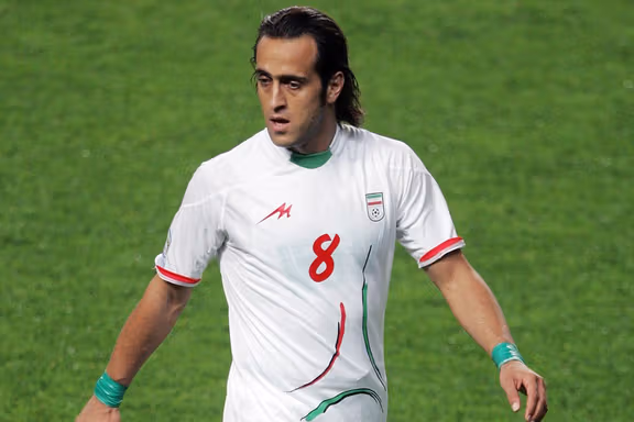 Karimi in 2009 wearing green wristbands to show support for the Green Movement against the government.