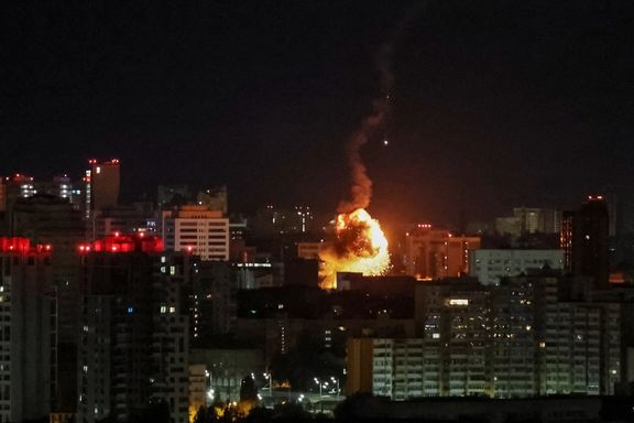 An explosion of a drone is seen in the city during a Russian drone strike in Kyiv, September 10, 2023.