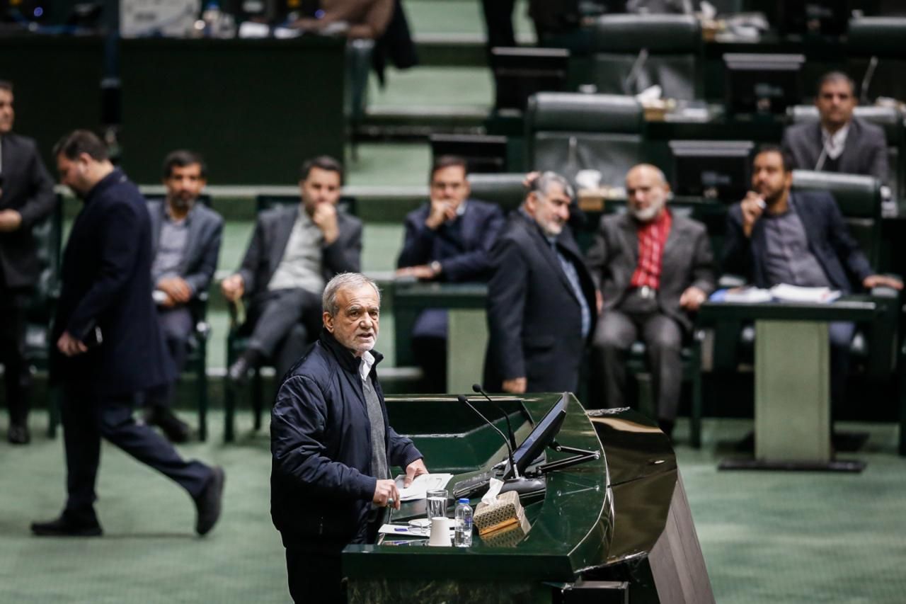 Iranian President Masoud Pezeshkian attends a parliamentary session to defend the government’s draft budget for the next Iranian year at the parliament in Tehran on December 28, 2025.