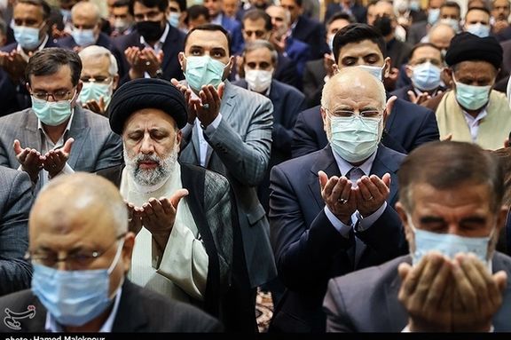 Iran's President Ebrahim Raisi and his fellow hardliners praying in the parliament. April 18, 2022