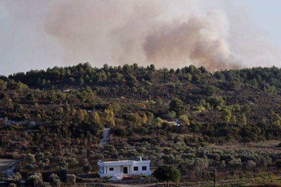 Smoke rises after Israeli shelling , as seen from Lebanese side, near the border with Israel, in Alma Al-Shaab, southern Lebanon, October 13, 2023.