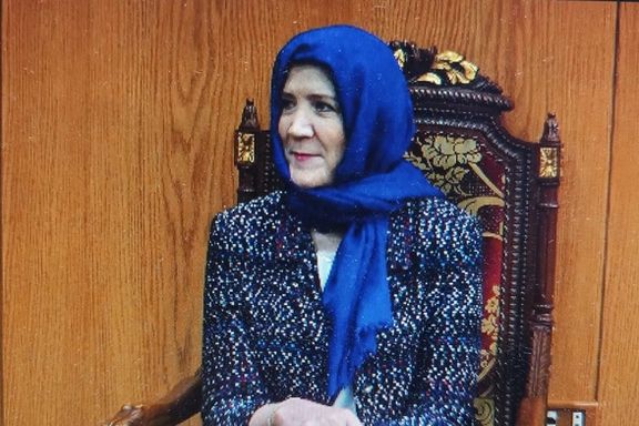 Ambassador Dorothy Shea with a headscarf in a meeting with Hezbollah supporters