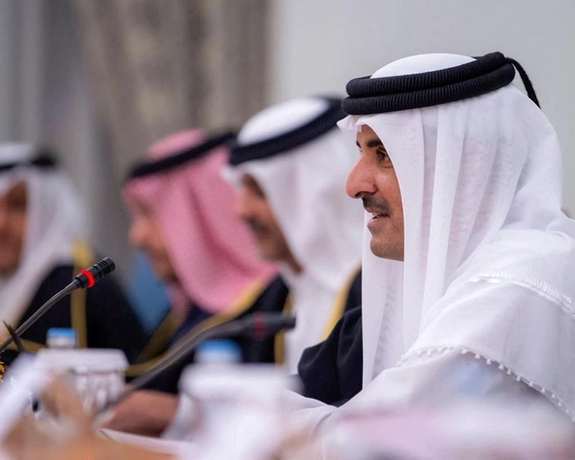 Qatar's Emir Sheikh Tamim bin Hamad al-Thani speaks during a meeting with Saudi Crown Prince, Mohammed bin Salman, in Doha, Qatar, December 8, 2021.