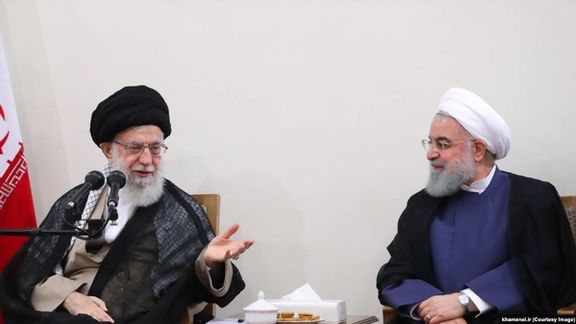 An older photo of a meeting between Khamenei and Rouhani.