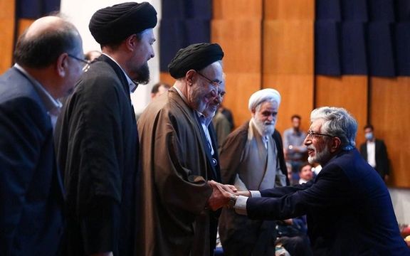 Mohammad Khatami shaking hands with Gholam-Ali Haddad Adel, an influential conservative politician and a relative of Supreme Leader Ali Khamenei. May 30, 2023