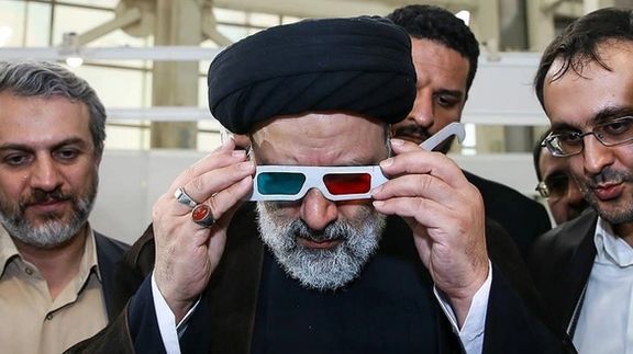Iran's president Ebrahim Raisi visiting a technology company