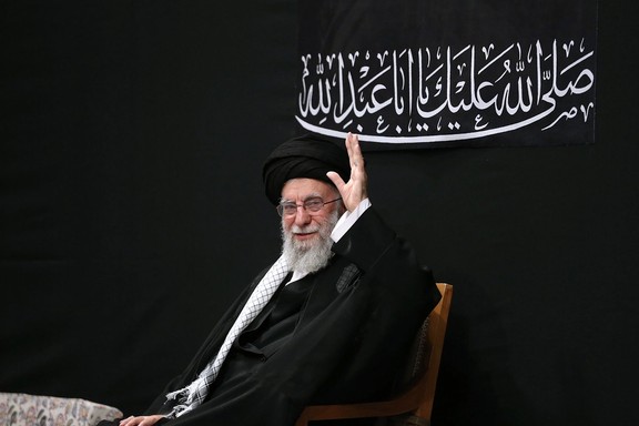 Iran's supreme leader Ali Khamenei waving to supporters during his first public appearance after Israel began its strikes, Tehran, Iran, July 5, 2025