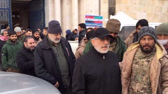Picture taken in the northwestern Syrian city of Aleppo on February 8, 2023, shows Quds Force commander Esmail Ghaani (second right)