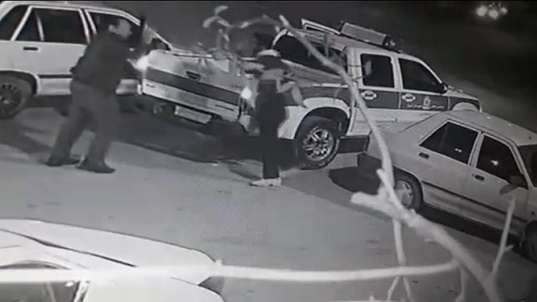 CCTC image showing a man attacking a police officer with a large knife on February 2, 2022