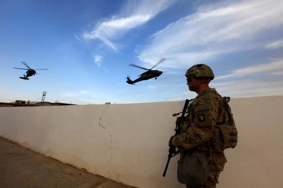 A US army soldier stands with his weapon at a military base in the Makhmour area near Mosul during an operation to attack Islamic State militants in Mosul, Iraq, October 18, 2016.