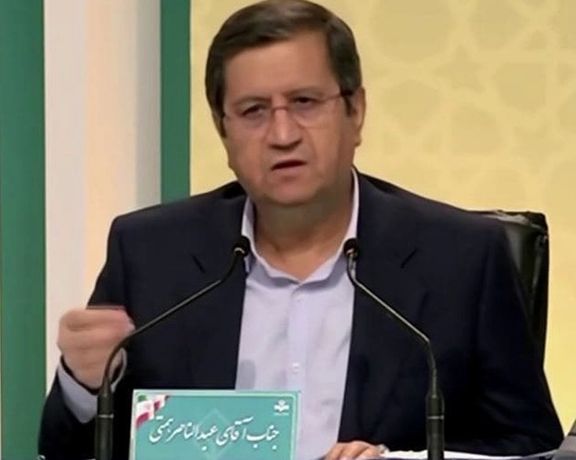 همتی درباره وعده رئیسی: اقتصاد مانند دادگاه و زندان نیست