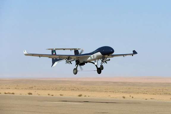 A drone flies during a military exercise in an undisclosed location in Iran.