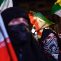 Calls for secrecy in Tehran reflect divisions over US talks