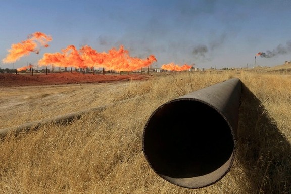 Flames emerge from flare stacks at oilfields in Kirkuk, Iraq October 18, 2017.
