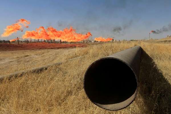 US warned Iraq of oil sanctions, freezing ties over Iran ties - Reuters