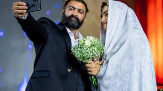 Iran's parliament cuts financial protections for brides