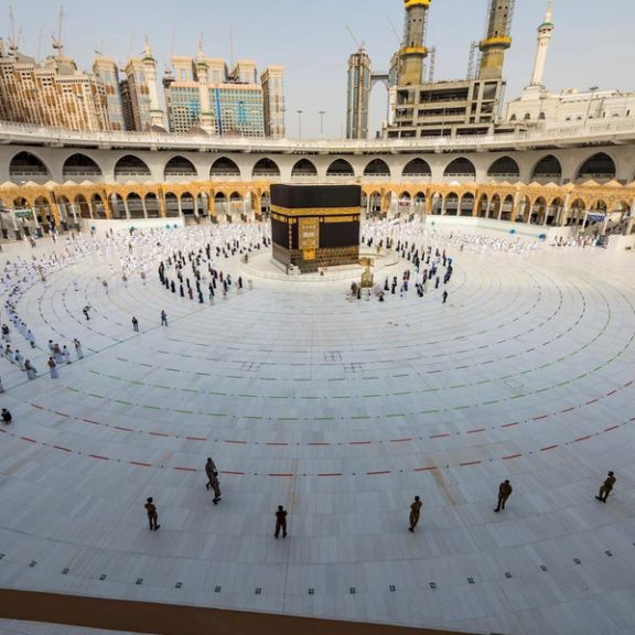 General view of Kaaba as Muslim pilgrims wearing face masks and keeping social distance pray facing Kaaba during the annual Haj pilgrimage amid the coronavirus disease (COVID-19) pandemic, in the holy city of Mecca, Saudi Arabia July 31, 2020