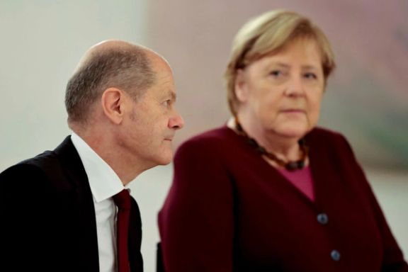 German Chancellor Angela Merkel and her likely successor Olaf Scholz. October 26, 2021