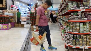 Iran faces wage dilemma amid sanctions, economic malaise