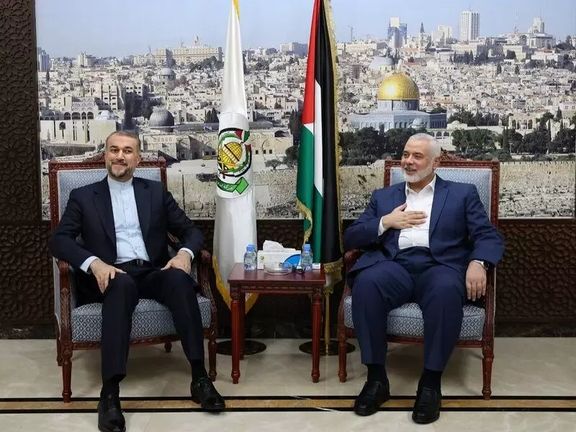 Iran's Foreign Minister Hossein Amir-Abdollahian in a meeting with Hamas' political bureau head, Ismail Haniyeh, in Qatar, February 2024