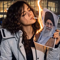 Lighting cigarette with burning Khamenei portrait becomes protest symbol