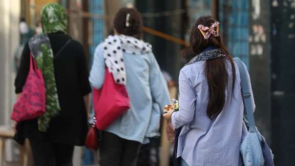 Iranian women without mandatory hijab in streets of capital Tehran